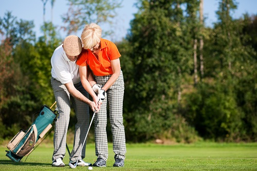 Active Adult Community Playing Golf
